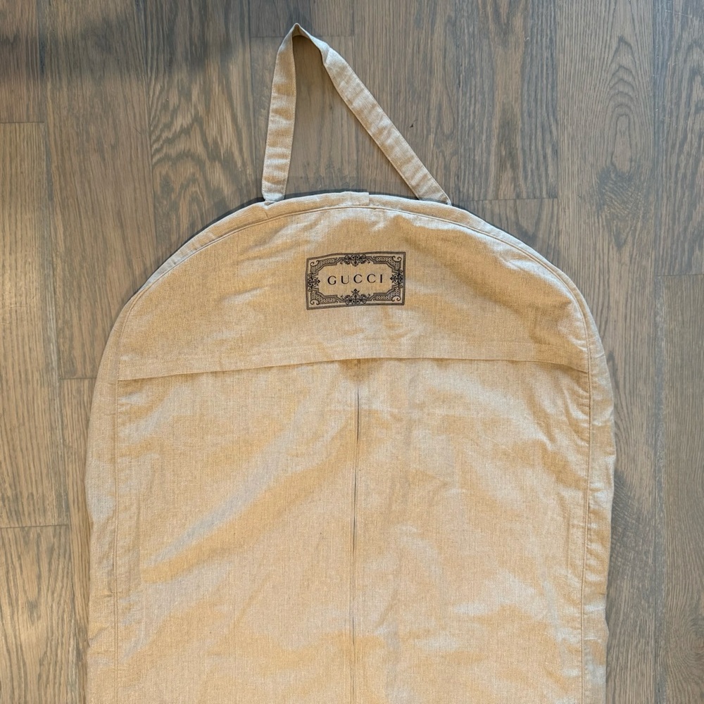 Gucci hanging garment bag. Brand new. Approximately 45”x26”